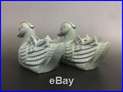 A pair of rare Chinese porcelain Ru kiln celeste glaze mandarin duck statues