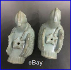 A pair of rare Chinese porcelain Ru kiln celeste glaze mandarin duck statues