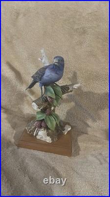 Andrea by Sadek Blue Bird Figurine on Branch w Berries Porcelain 8405Grosbeak