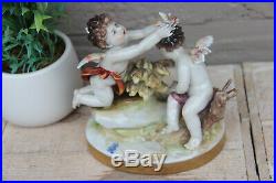 Antique German Volkstedt porcelain marked putti group figurine statue bird
