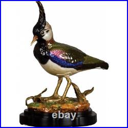 Bird Haven Porcelain Figurine
