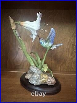 Hamming Bird With Amaryllis Fine Porcelain And Bronze