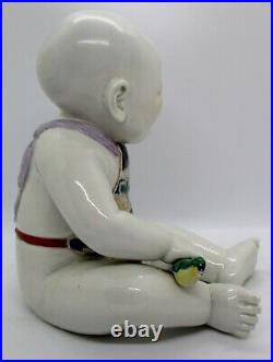 Japanese Okimono Imari Porcelain Polychrome Seated Boy with Bird Statue Maigi