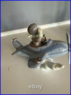 Lladro Porcelain Figurine #5697 Pilot Boy with Airplane and Birds