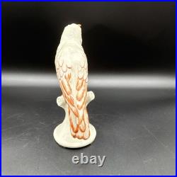 Porcelain bird figurine hand-painted orange/gold accents