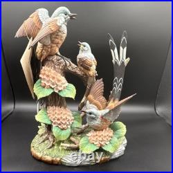 Porcelain figurine titled'Scissor-tailed Flycatcher' by Andrea