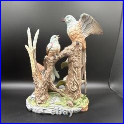 Porcelain figurine titled'Scissor-tailed Flycatcher' by Andrea