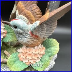 Porcelain figurine titled'Scissor-tailed Flycatcher' by Andrea
