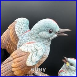 Porcelain figurine titled'Scissor-tailed Flycatcher' by Andrea