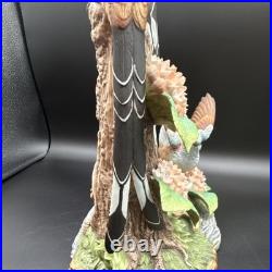 Porcelain figurine titled'Scissor-tailed Flycatcher' by Andrea