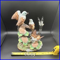 Porcelain figurine titled'Scissor-tailed Flycatcher' by Andrea