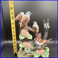 Porcelain figurine titled'Scissor-tailed Flycatcher' by Andrea