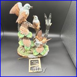 Porcelain figurine titled'Scissor-tailed Flycatcher' by Andrea
