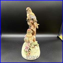 Porcelain figurine titled'Three Birds on Branch withApple Blossoms'Andrea by Sadek