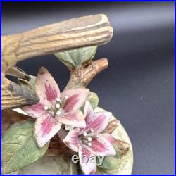 Porcelain figurine titled'Three Birds on Branch withApple Blossoms'Andrea by Sadek
