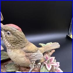 Porcelain figurine titled'Three Birds on Branch withApple Blossoms'Andrea by Sadek