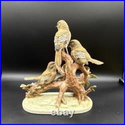 Porcelain figurine titled'Three Birds on Branch withApple Blossoms'Andrea by Sadek