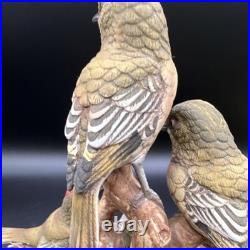 Porcelain figurine titled'Three Birds on Branch withApple Blossoms'Andrea by Sadek