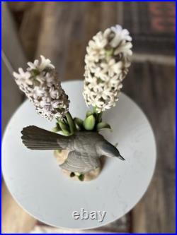 Porcelain sculpture titled'Catbird with Hyacinths' by Boehm