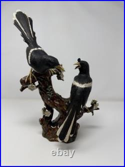 Two birds sitting on tree stub vintage porcelain figure