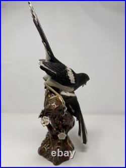 Two birds sitting on tree stub vintage porcelain figure