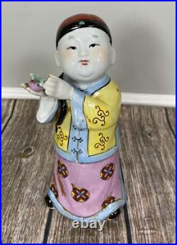 Vintage Chinese Porcelain Figurine Boy in Hat Holding A Bird 10.5 Tall